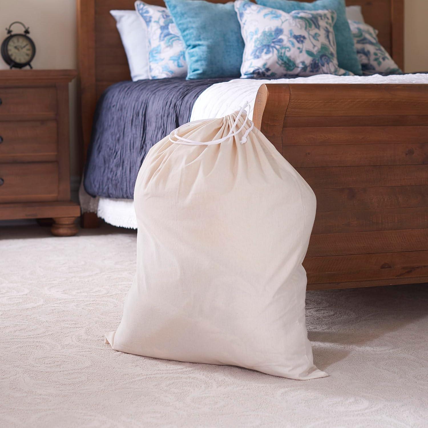 image:imageHousehold Essentials Cotton Laundry Bag Large 100 Cotton Drawstring Top with Cord Lock Machine Washable 3 to 4 Load Capacity Versatile and Compact Breathable Foldable NaturalBeige
